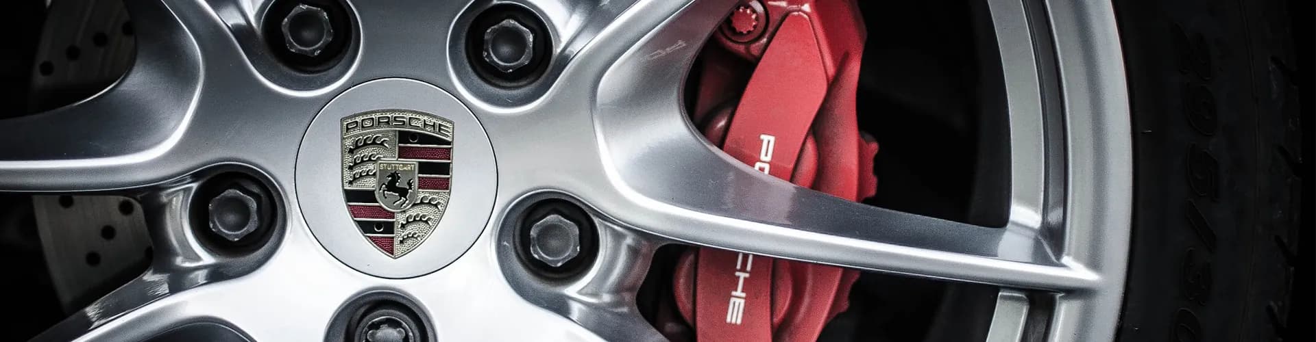 Photographer taking pictures of classic cars at Cars & Coffee